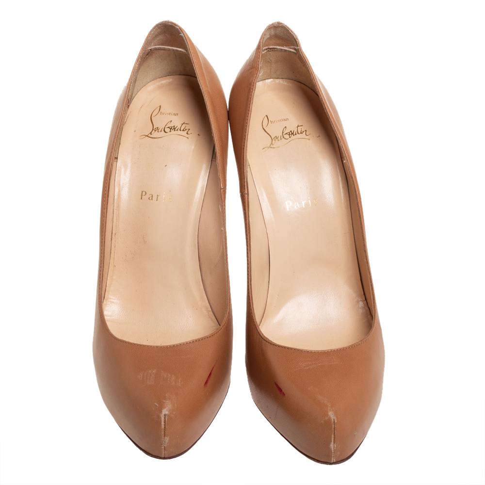 Every shoe collection needs a pair of ageless pumps as elegant as this one from Christian Louboutin. Made from leather in a beige hue, these pumps flaunt almond toes leading to an arch that ends on a high note with sleek stiletto heels supported by