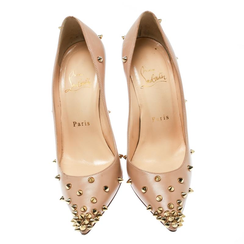 Think of high heels and Christian Louboutin is what comes to our minds. These exquisite and regal beige Degraspike pumps from the Parisian label are worth dying for. Crafted in leather, these pumps have stunning details like the pointed toes, smooth