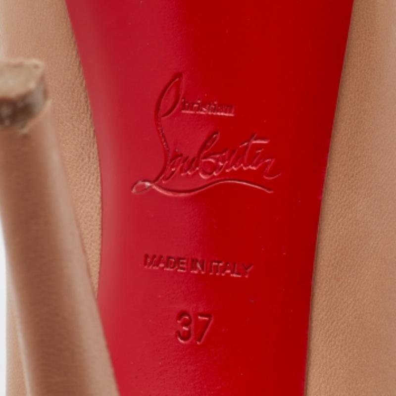 This pair of Christian Louboutin pumps is the perfect inspiration for a stylish look. Created from beige leather, it features platforms, 13.5cm heels, and signature red-lacquered soles.