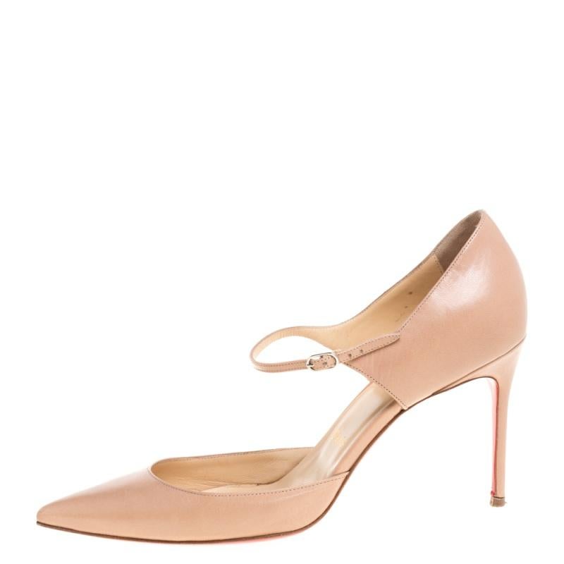 These Tirana pumps from Christian Louboutin have come straight from a shoe lover's dream. Crafted from beige leather, the pumps are designed in a Mary Jane silhouette with pointed toes and are balanced on high stiletto heels. They are lovely and