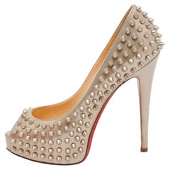 red bottoms with spikes heels
