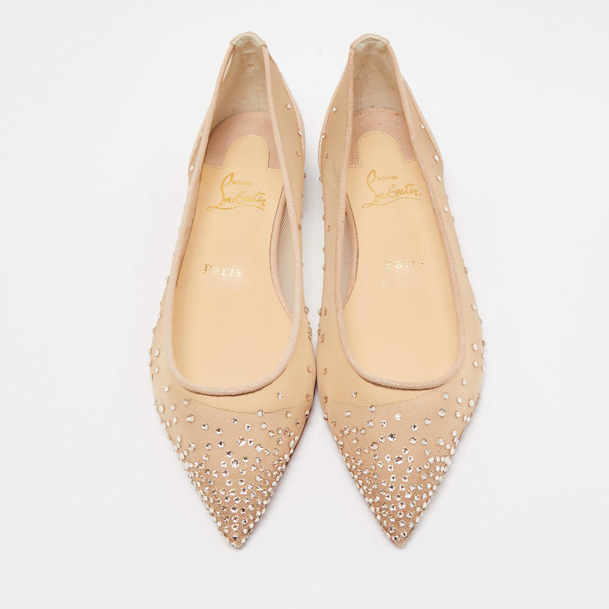 These embellished ballet flats from Christian Louboutin have been designed to lift your style. They are crafted from mesh as well as suede and are designed to hold your feet fashionably.

