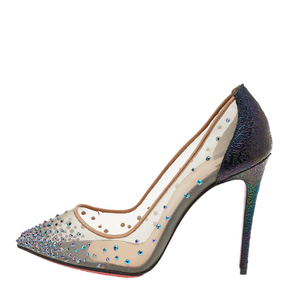 Inspired by the famous Parisian cabaret 'Follies Strass,' the House of Christian Louboutin has crafted these iconic and impeccable pumps by incorporating a distinctive design and the signature red-lacquered soles. They are made from mesh, glitter,