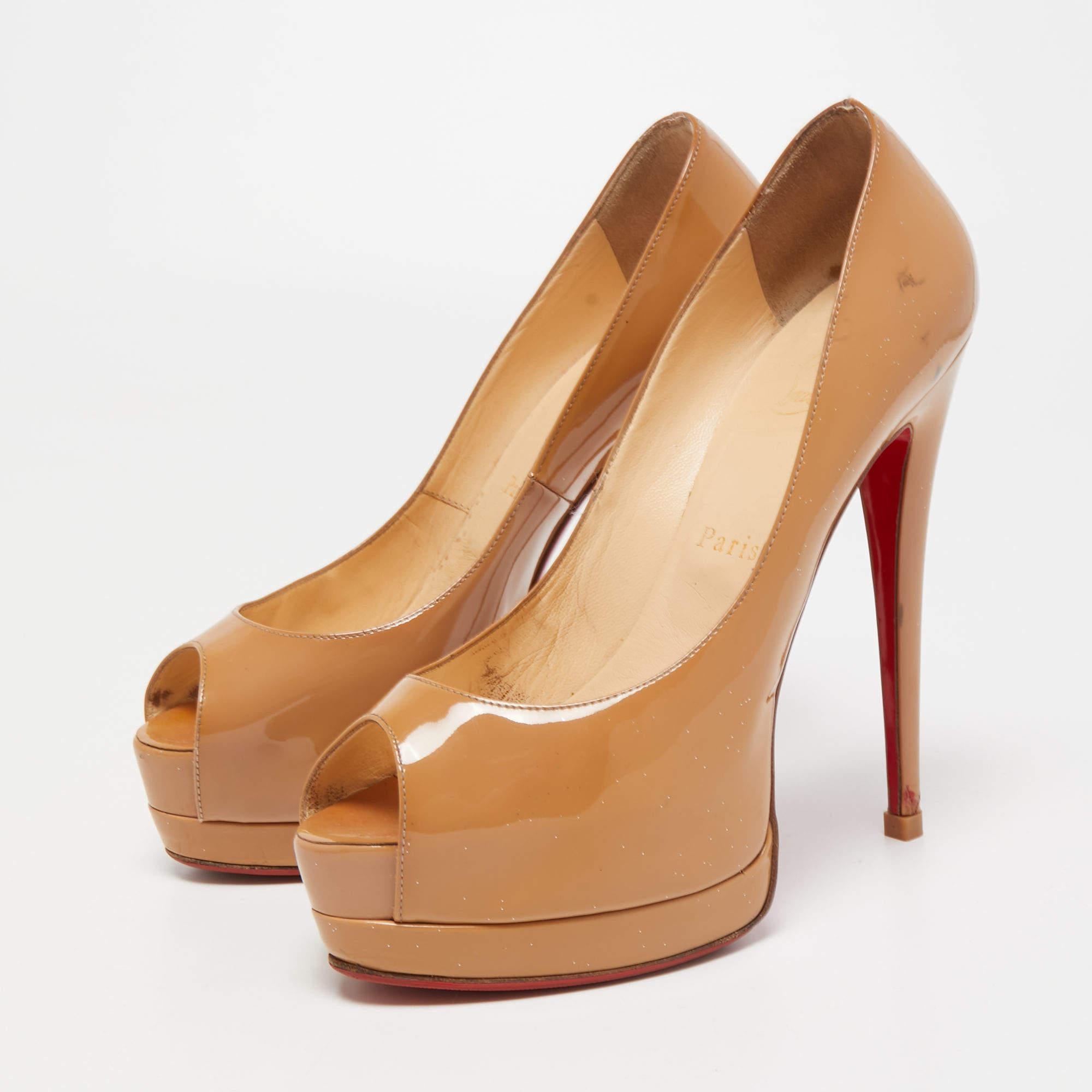 These Christian Louboutin pumps are a great choice if you’re looking to add a pair that's both classy and versatile. The pair has been made in Italy from beige patent leather and set on platforms, and 14.5 cm heels.

