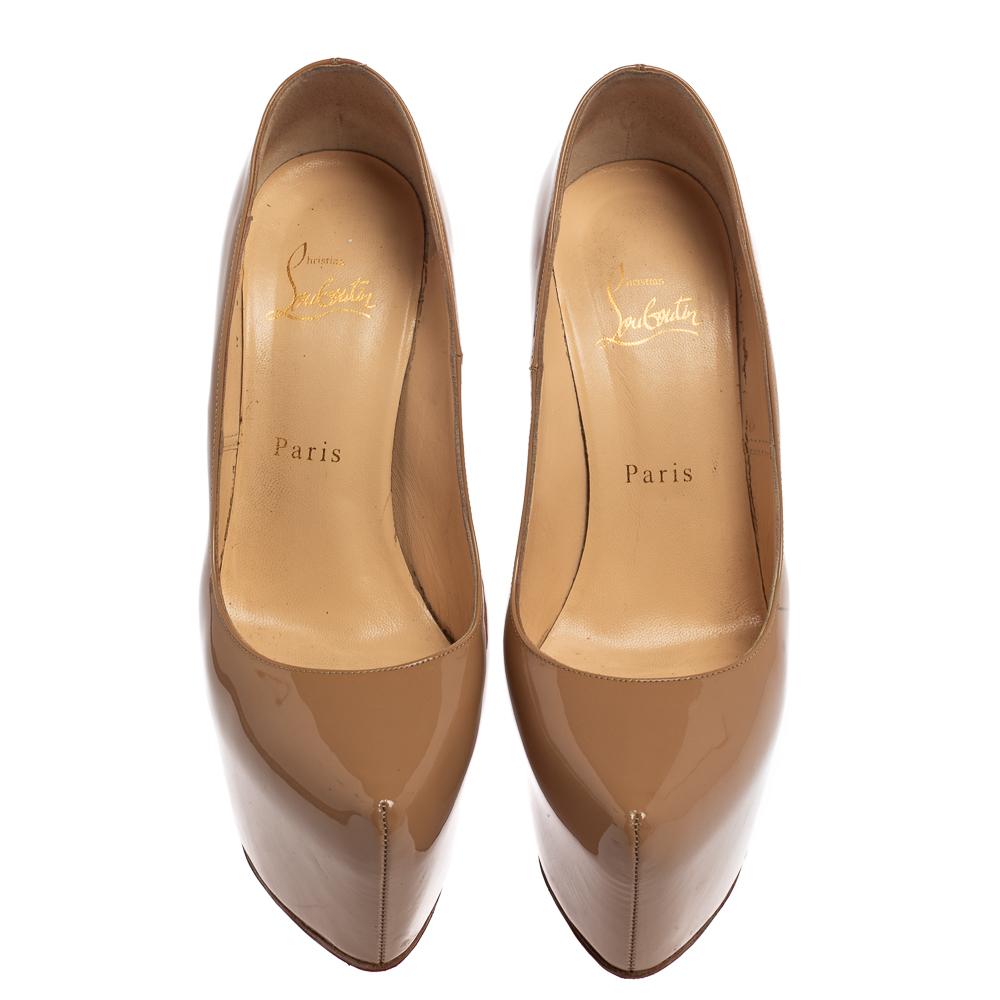 Take your love for Louboutins to new heights by adding this gorgeous pair to your collection. The pumps simply speak high fashion in every stitch and curve. The exteriors come made from beige patent leather and the pumps are finished with concealed