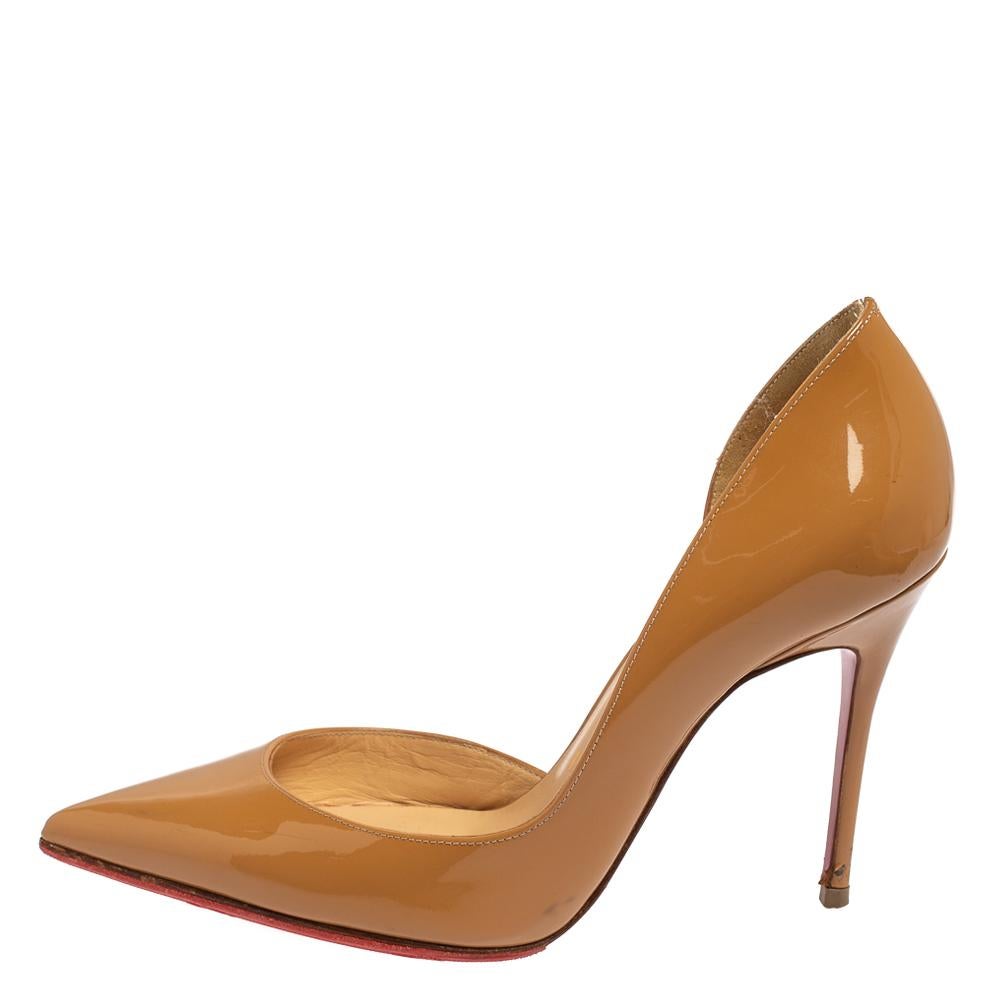 Skilfully crafted from patent leather in a D'orsay style with pointed toes, these Christian Louboutin pumps come ready to give you a high-fashion experience. The rich beige pumps, with sharp-cut toplines, are balanced on 9.5 cm heels and finished