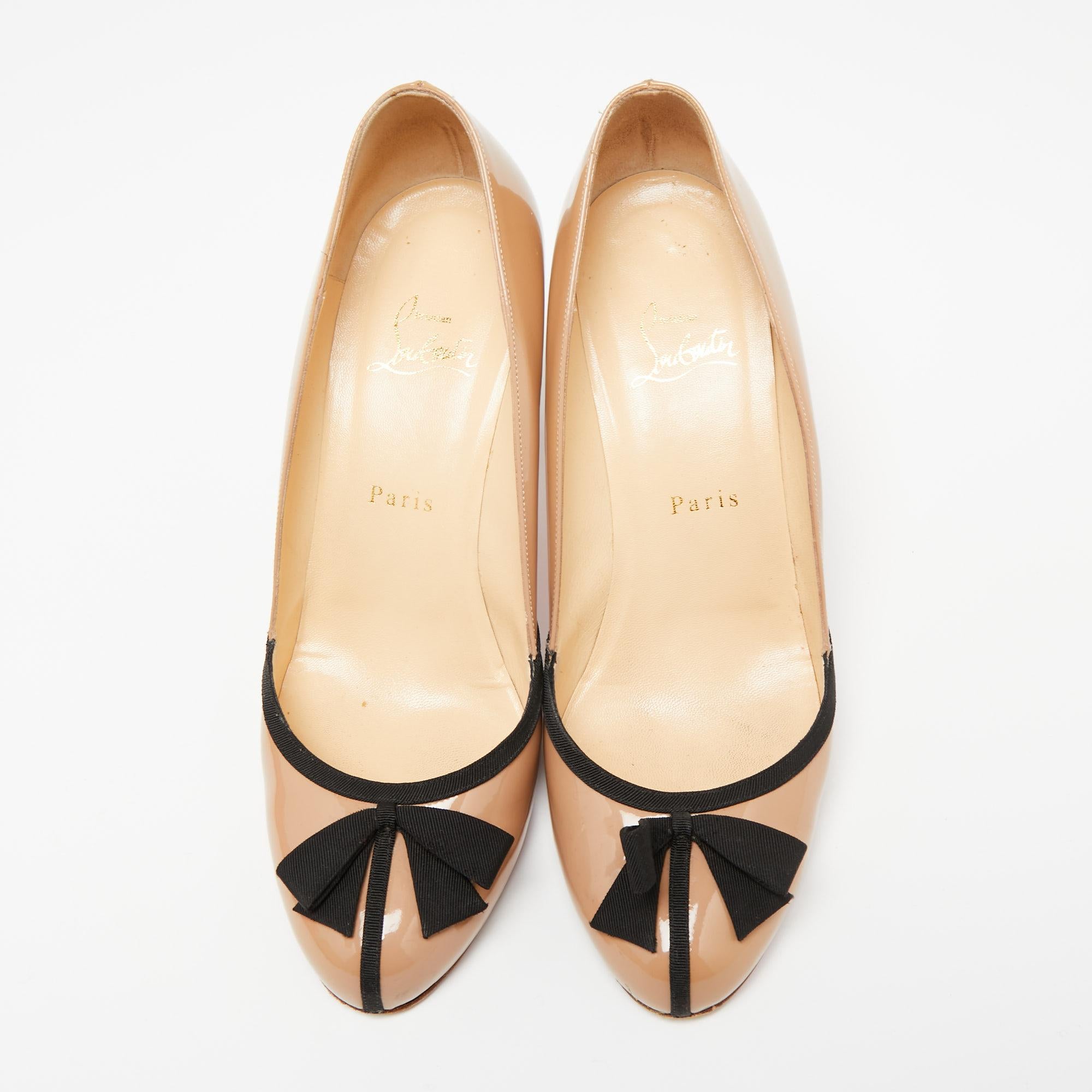 Statement pumps for you to stand out! These beige Christian Louboutin pumps are crafted from patent leather and feature rounded toes and 8.5 cm heels. They are perfect for casual dinner outings.

Includes: Original Dustbag, Original Box, Extra heel