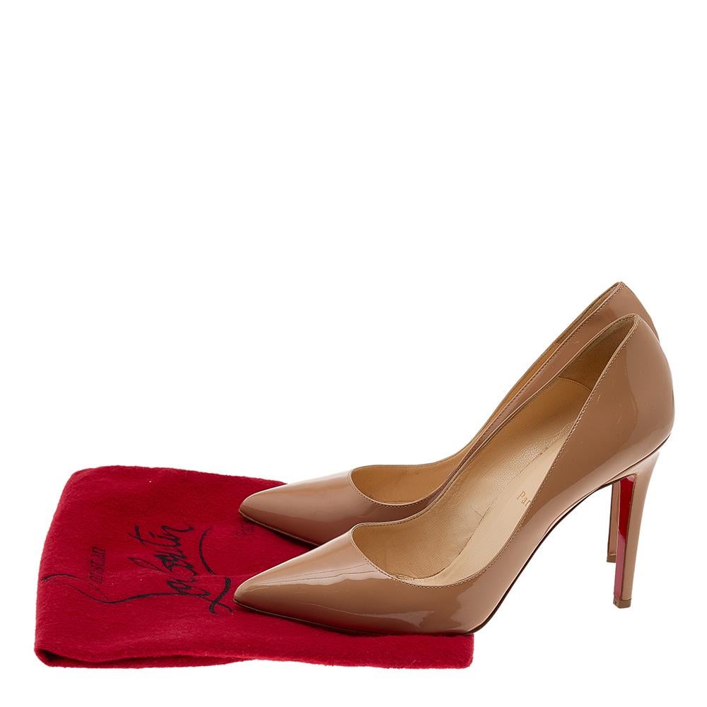 Presented by the iconic fashion label Christian Louboutin, these Pigalle pumps never fail to capture attention. With their soles lined courageously using signature red lacquer and their stunning silhouette made from beige patent leather, these pumps