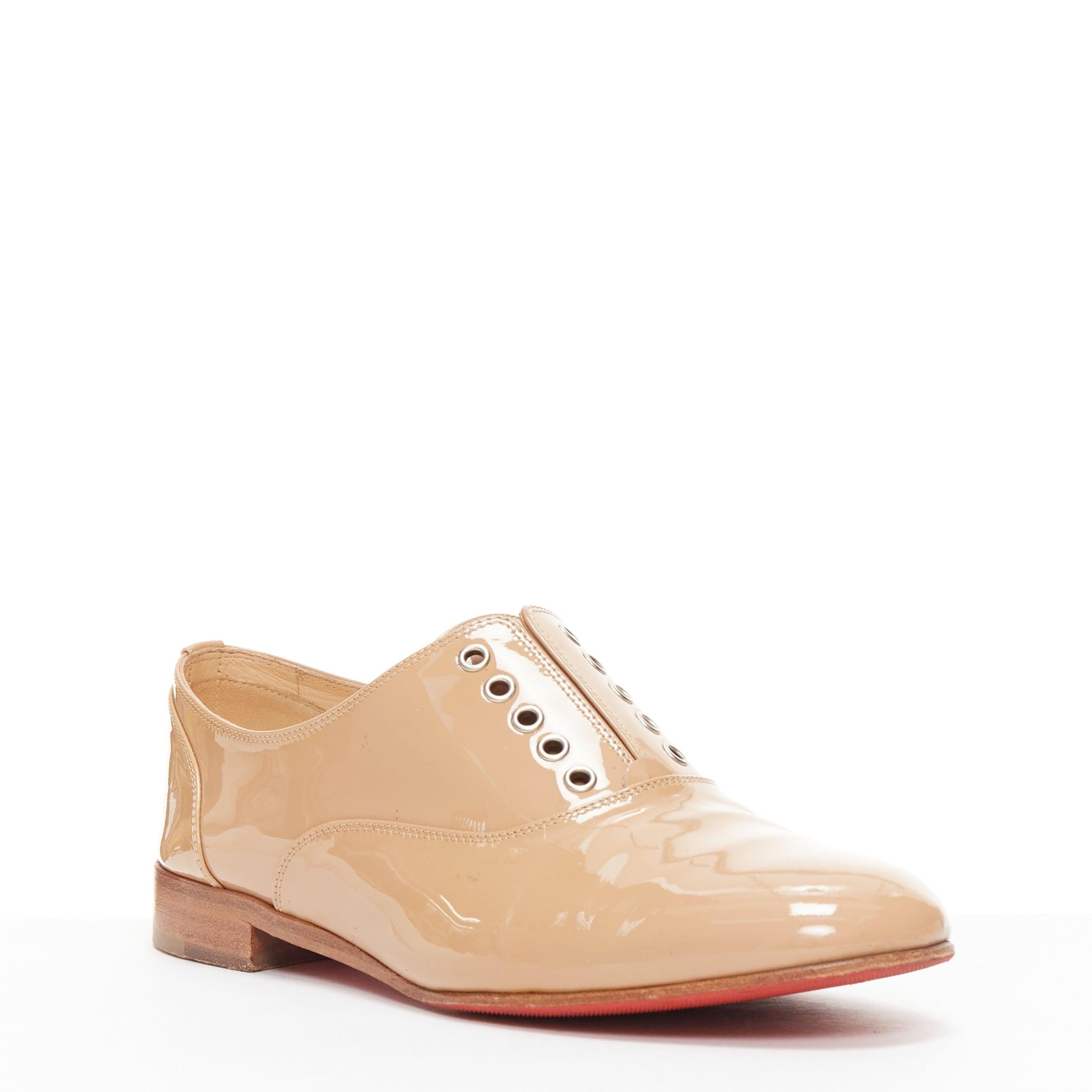 CHRISTIAN LOUBOUTIN beige patent leather round toe derby flat shoes EU35.5
Reference: YIKK/A00081
Brand: Christian Louboutin
Material: Leather
Color: Nude, Silver
Pattern: Solid
Closure: Lace Up
Lining: Nude Leather
Extra Details: Does not come with