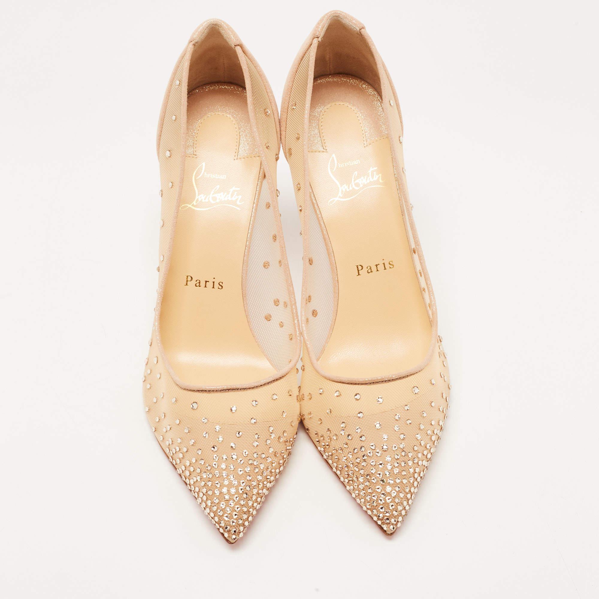 The Christian Louboutin pumps are exquisite designer shoes. Made from luxurious beige suede and mesh, these pumps feature a pointed-toe design that exudes elegance and sophistication. Adorned with dazzling strass crystals, they add a touch of