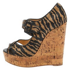 Christian Louboutin Bombas de cuña de corcho Melisa de lona negra/beige Talla 38