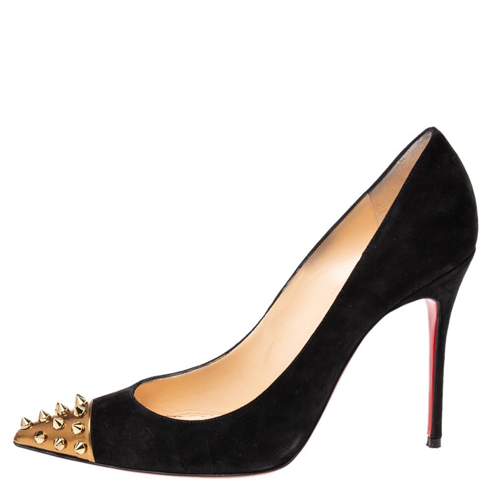Be ready for praises and compliments when you walk in these pumps from Christian Louboutin. Crafted from black suede, they carry pointed toes and have spikes decorating the gold-tone cap toes. The stunning pair is complete with 10.5 cm heels and the