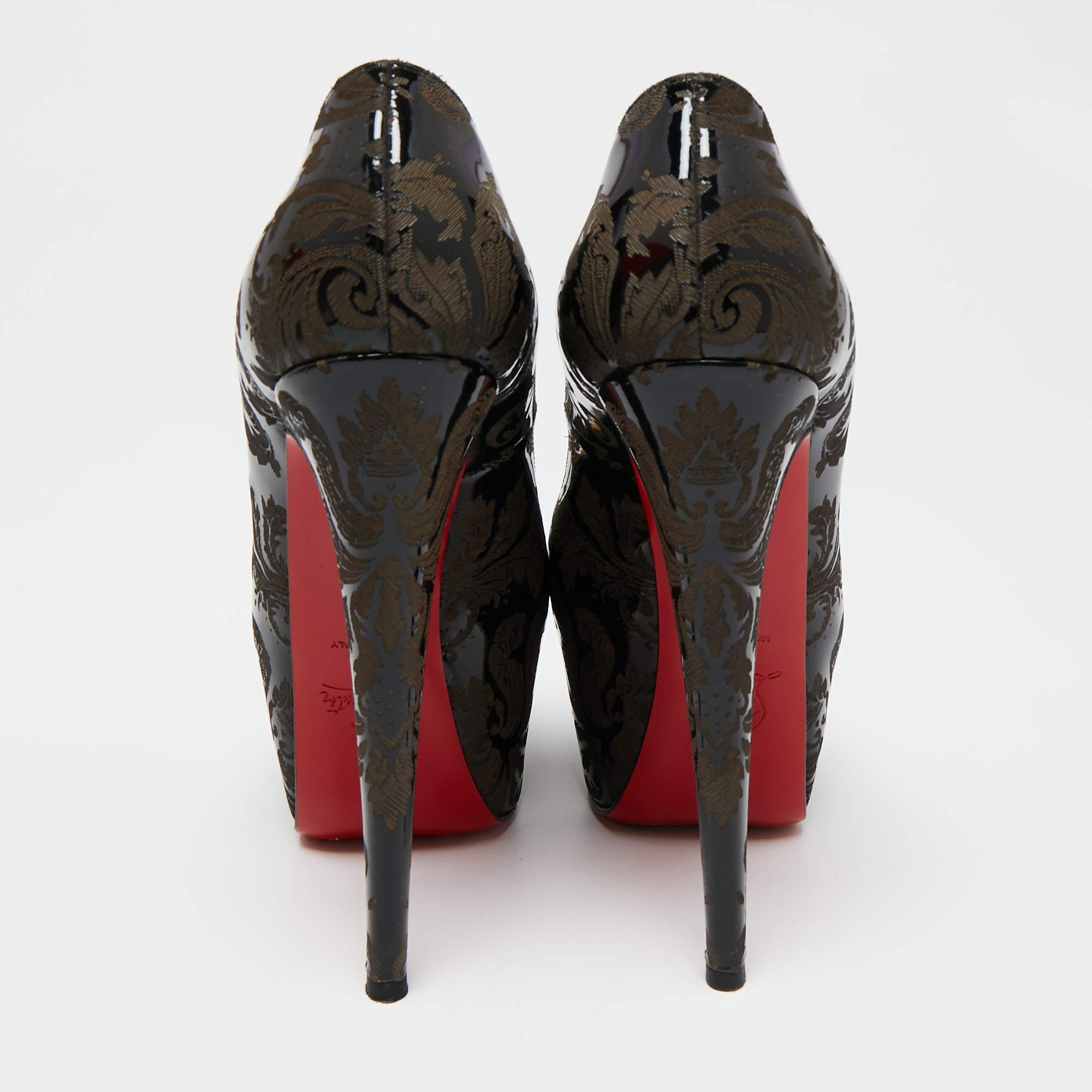 Set on towering heels and crafted with perfection, these Highness pumps from Christian Louboutin are here to elevate your style and take it higher! They are created using black-brown patent leather, highlighted with Arabesque detailing. They have