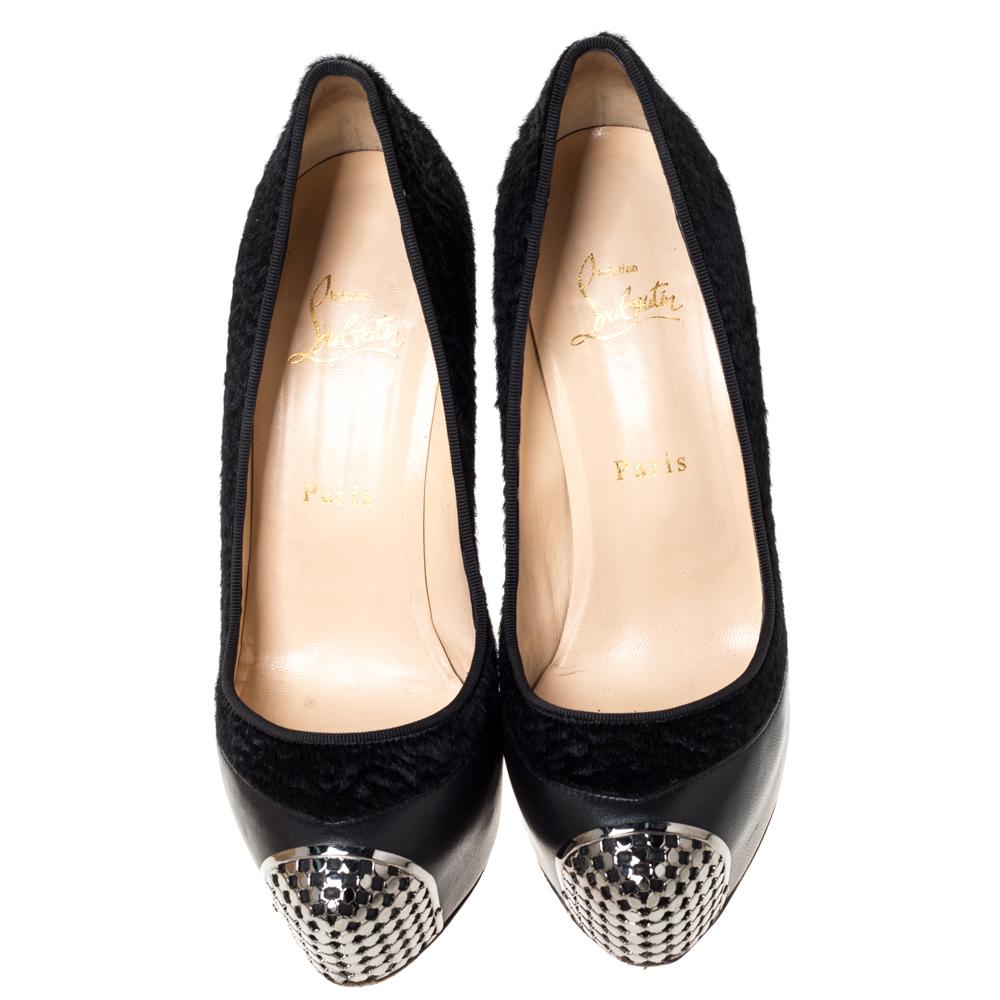 To give you an extraordinary experience, Christian Louboutin brings you this pair of Maggie pumps that will elongate your feet and give you confidence in every step. They are crafted from calf hair and leather and styled with embellished cap toes
