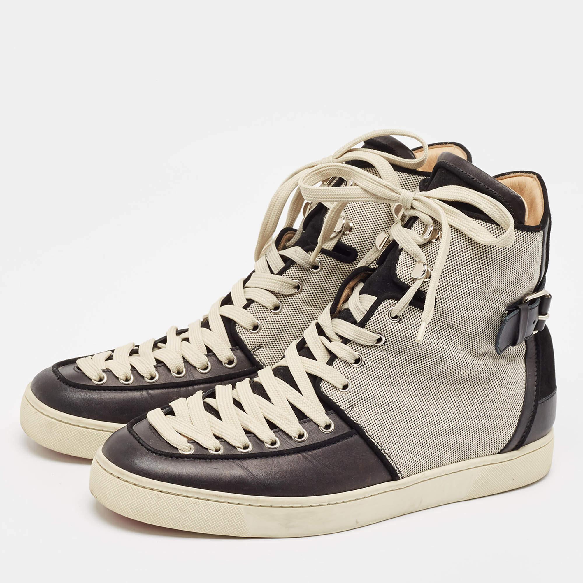Presented in a classic silhouette these Christian Louboutin sneakers are a seamless combination of luxury comfort and style. These sneakers are designed with signature details and comfortable insoles.