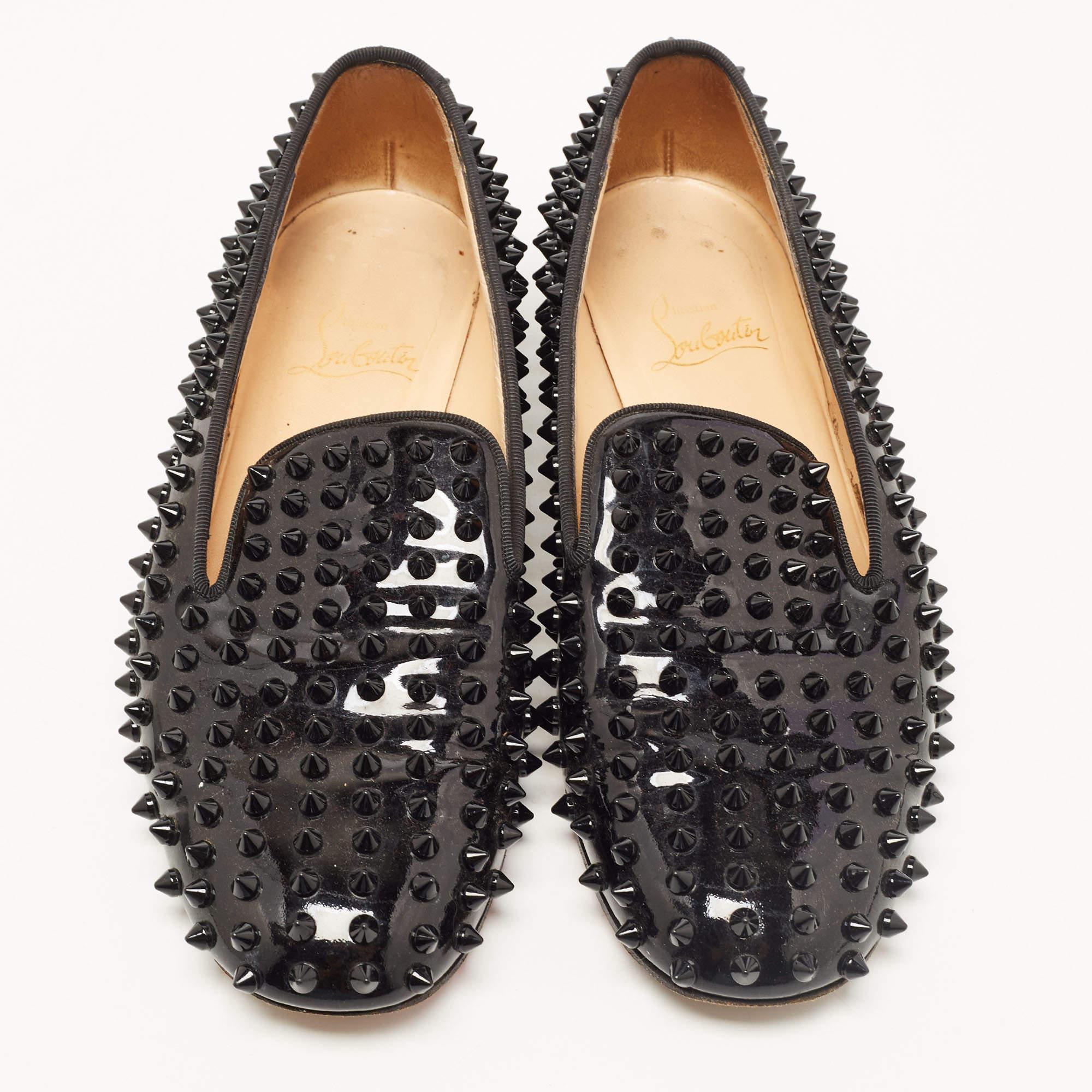Add a statement appeal to your outfit with these Christian Louboutin slippers. Made from premium materials, they feature spikes, round toes, and red soles.

Includes
Original Dustbag