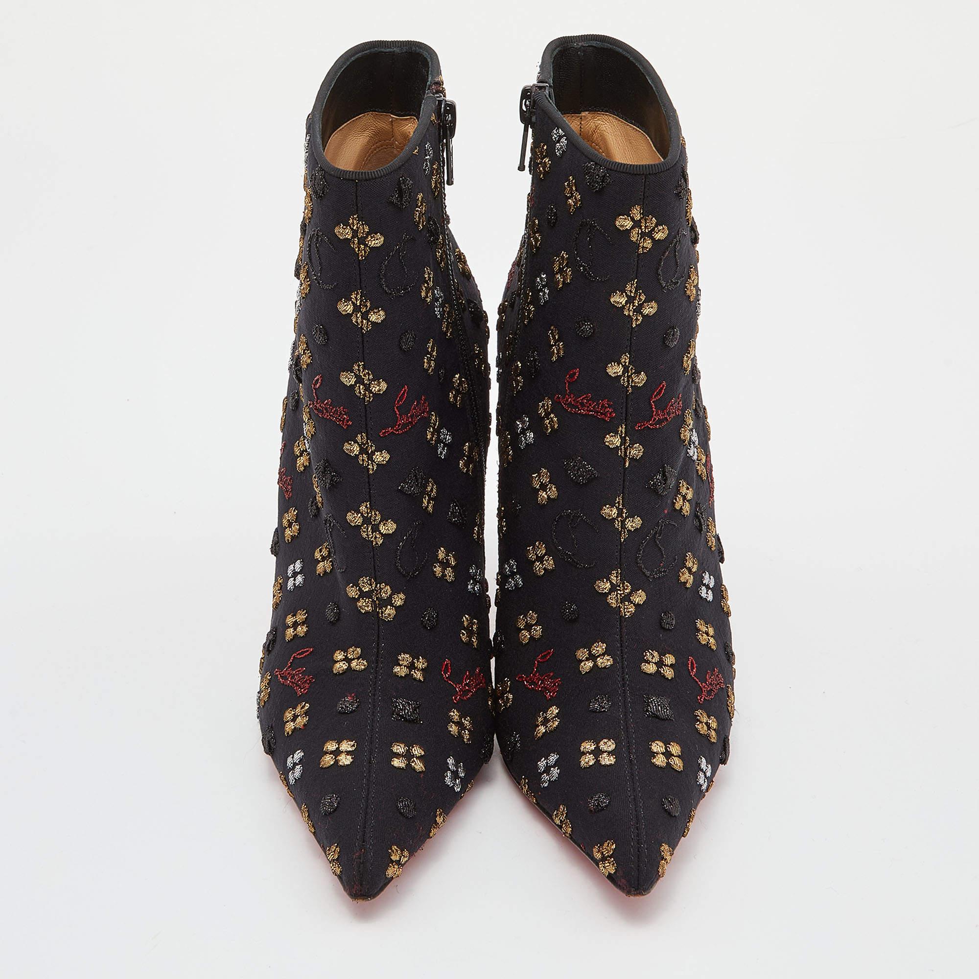 Let your latest shoe addition be this fabulous pair of ankle booties from Christian Louboutin. The black booties are crafted from embroidered fabric and feature pointed toes, 10.5 cm heels, and zipper closure.

Includes: Original Dustbag

