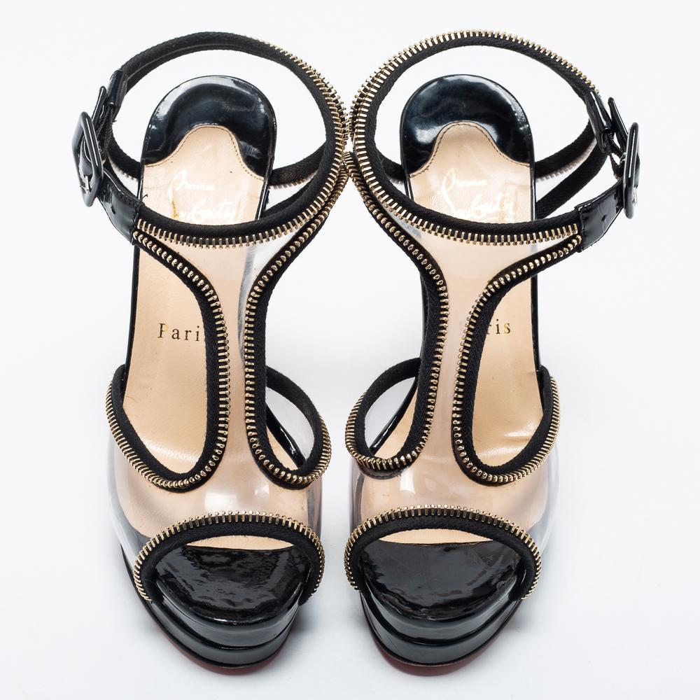 You can count on these sandals from Christian Louboutin for an elevated feel. They have a PVC upper with fabric & leather trims, mounted on platforms and 12.5 cm heels.

