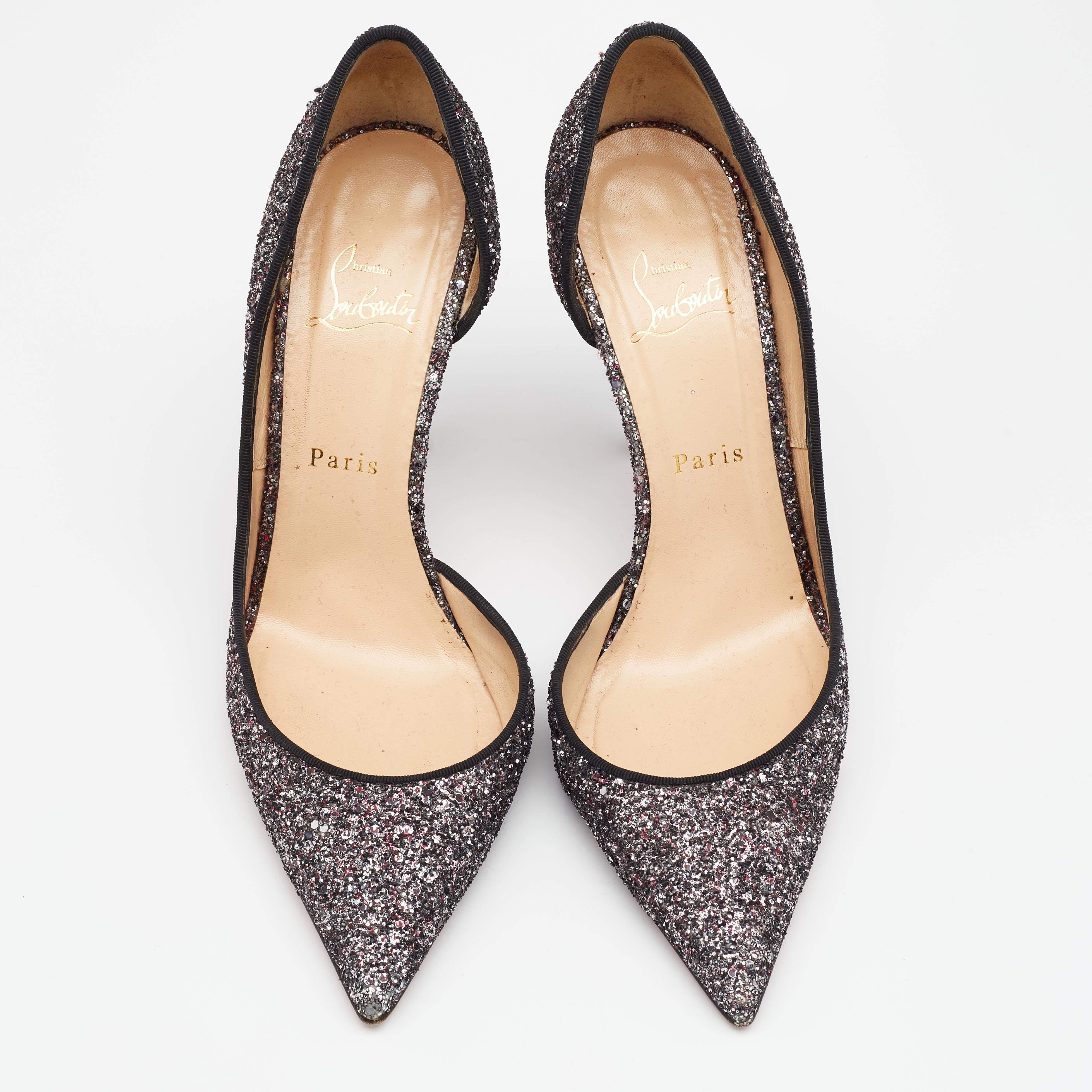 Christian Louboutin remains unmatched in terms of creating high-quality and amazing designer footwear, just like these Iriza D'orsay pumps. They have been created using black glitter and feature pointed-toes and slim heels. Truly beautiful in style