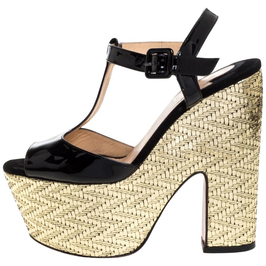 gold and black wedge heels