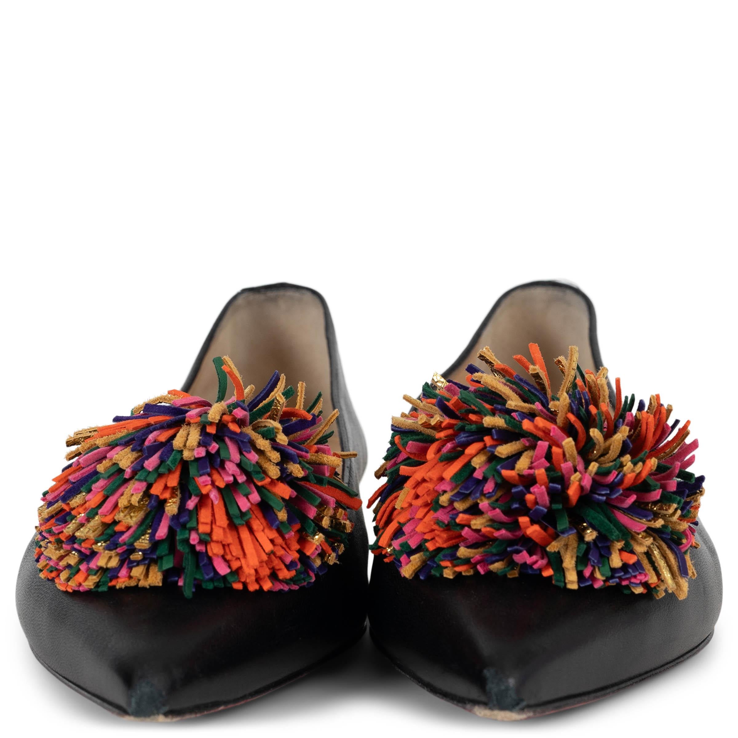 This 100% authentic Christian Louboutin Konstantina ballet flats in black leather bring a playful twist to classic elegance. Designed with pointed toes, they are adorned with a multicolor pompom for a bold, whimsical touch. Finished with a small
