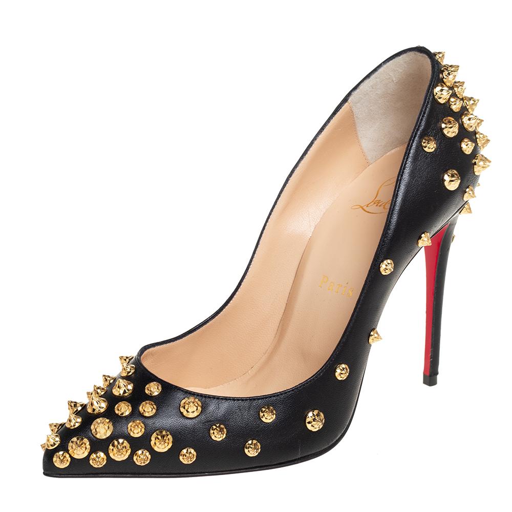 Stand out from the crowd with this gorgeous pair of Louboutins that exude high fashion with class! Crafted from leather, these pumps feature spike embellishments with pointed toes and a black exterior. Completed with leather insoles, stiletto heels,