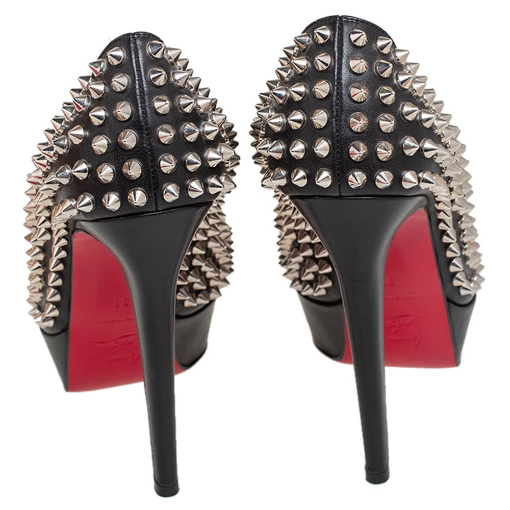 From the house of Christian Louboutin, this pair is an impeccable mix of comfort and bold style. Designed to perfection, this pair is made in black leather featuring Alti spikes in silver-tone all over, offering an edgy touch to the piece. They have