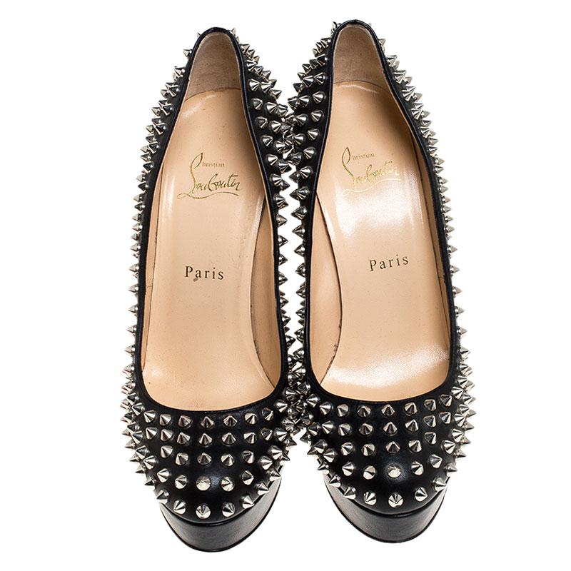 Complete your look with this stunning pair of platform pumps from Christian Louboutin. Crafted from leather, they are adorned with impressive silver-tone spikes, feature leather insoles, 13.5 cm heels and signature red soles. They are a great