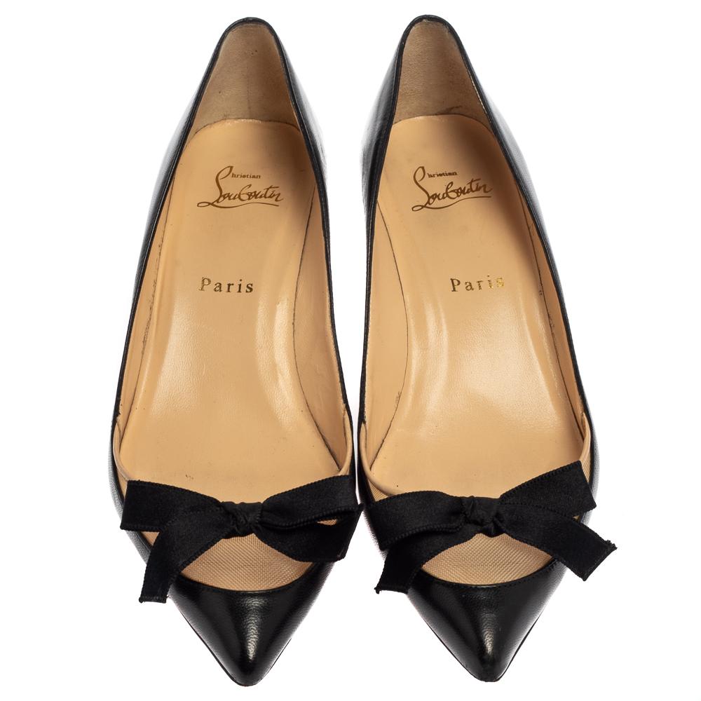 A stylish pair of shoes that are easy to wear and yet elegant enough for day parties, these Christian Louboutin pumps are perfect to add a touch of subtlety to your look. Crafted in black leather & mesh, these pumps feature bow detail on the vamps