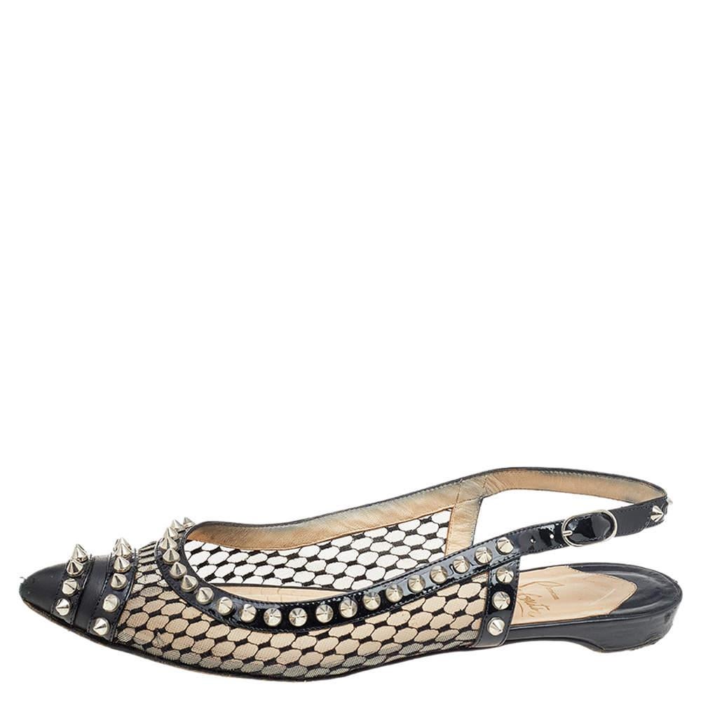 These Christian Louboutin sandals highlight a contemporary design that suits casual and semi-formal outfits effortlessly. Crafted from leather and mesh, the sandals come in black with spike decorations, buckle slingback fastening, and durable soles