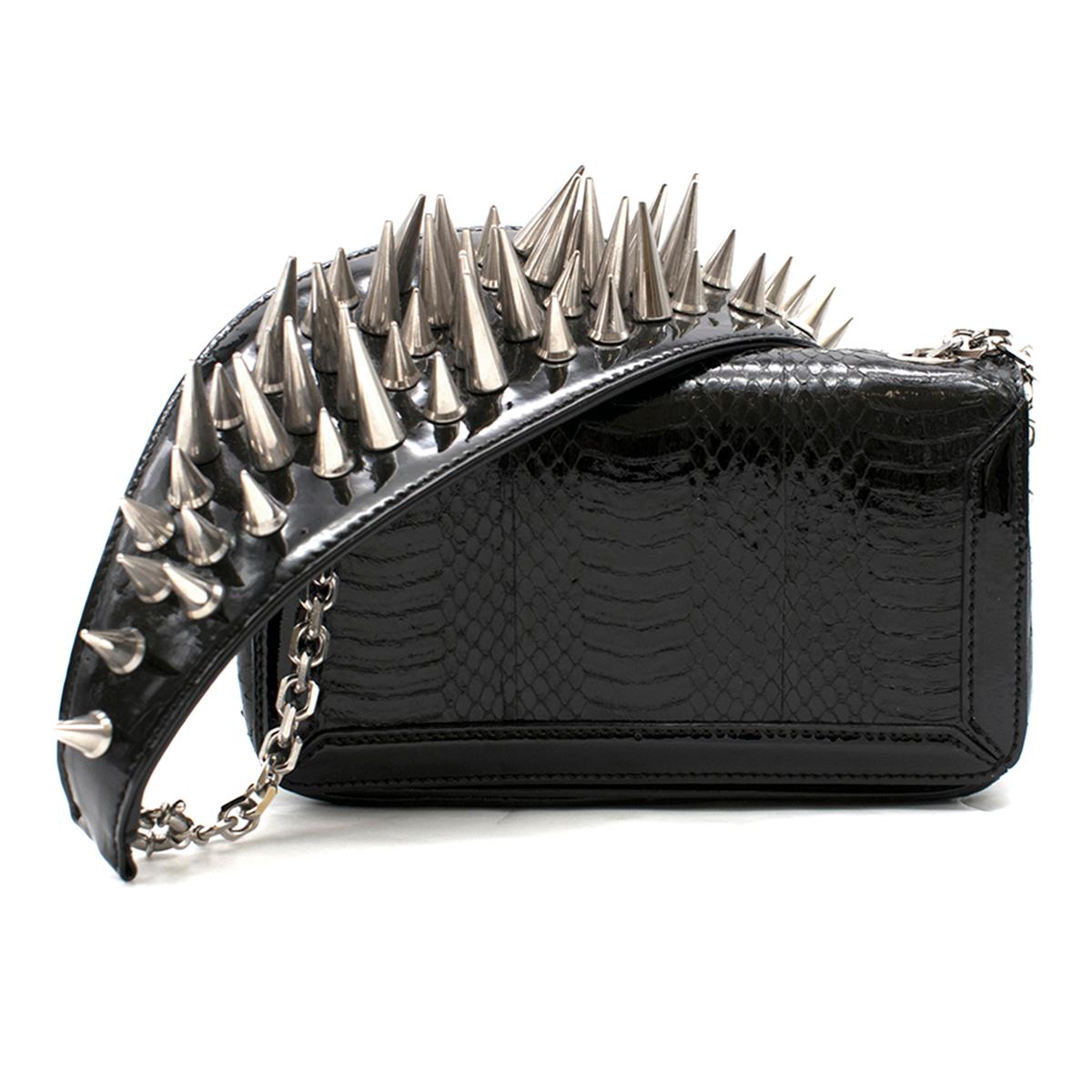 Christian Louboutin Black Leather Artemis Spike Stud Python Bag

- Mini black leather python shoulder bag
- Spike-studded patent leather shoulder strap with a silver-tone chain detail
- Front flap with push button and patent leather trimming
-