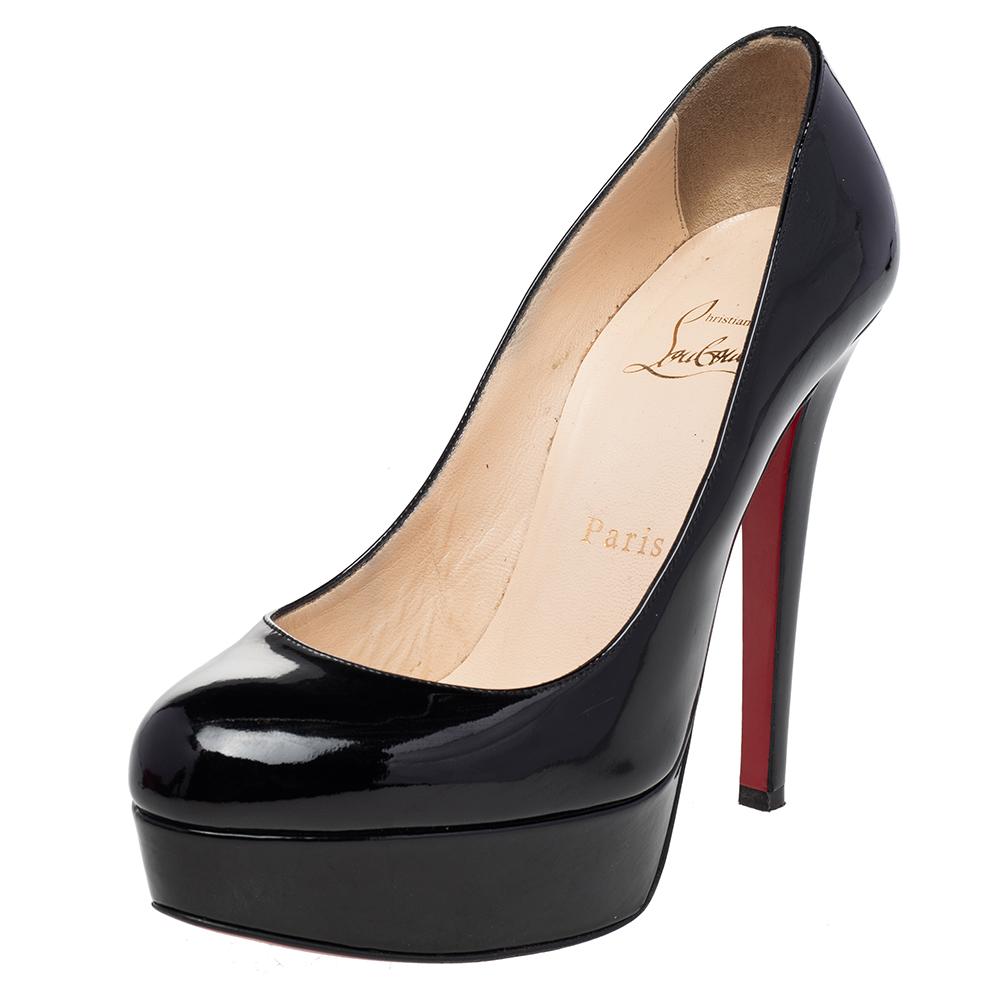 A classic to add to one's shoe collection is this pair. These Christian Louboutin beauties are covered in leather and styled with platforms, 12.5 cm heels, and the signature red soles. Add these black pumps to your closet today and flaunt them with