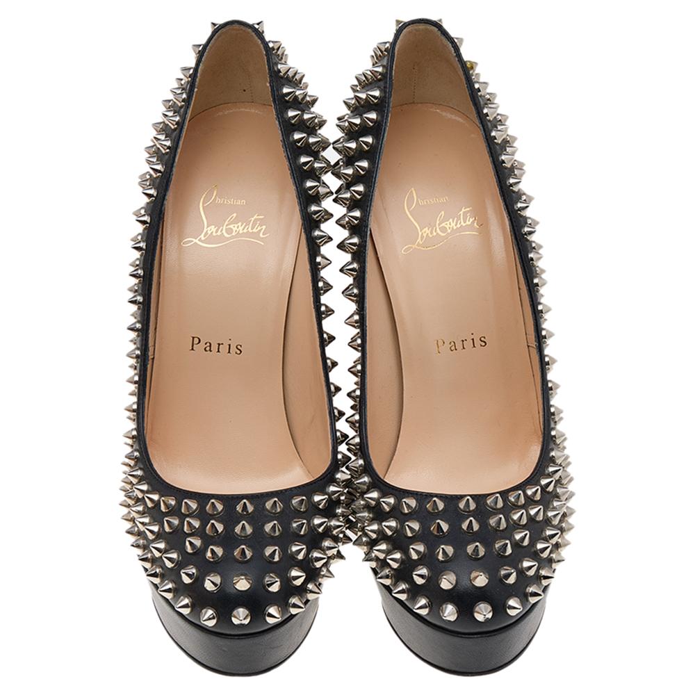 Feel the rockstar vibes with these fabulous Bianca pumps from Christian Louboutin. Carrying an edgy layout with spike details these black leather pumps are balanced on platforms and stiletto heels. Completed with the signature red sole, this