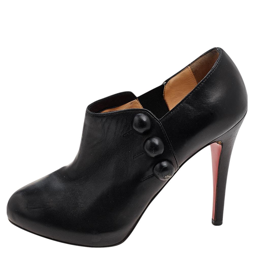 Coming from the House of Christian Louboutin, these stunning C'est Moi ankle booties will grant never-ending grace and poise to your feet. They are carved using black leather on the exterior and showcase covered toes, platforms, and towering heels.