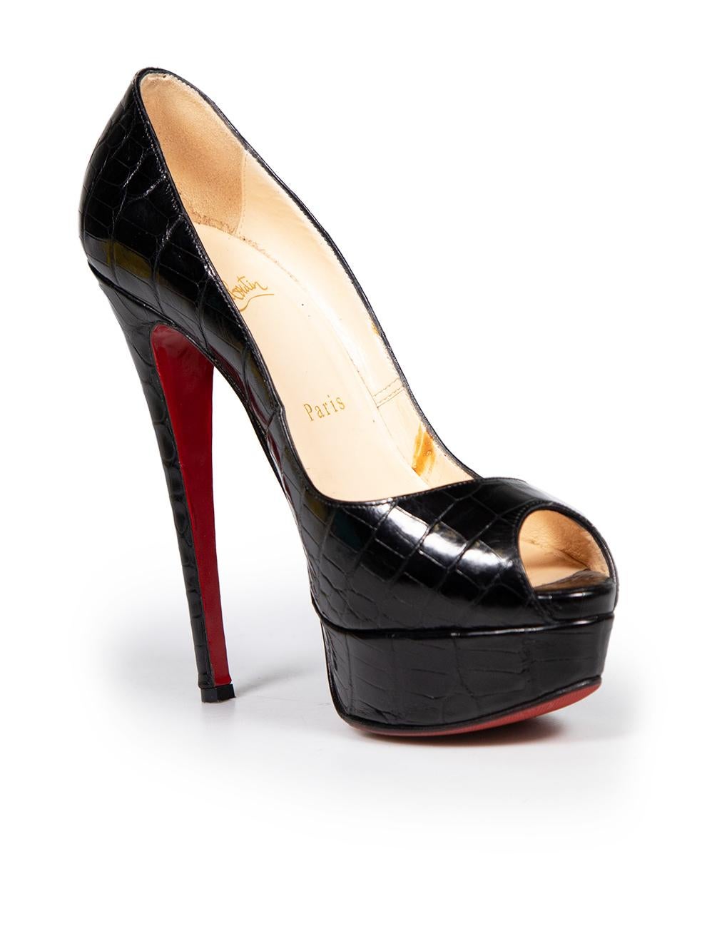 CONDITION is Good. Minor wear to heels is evident. Light wear is seen with abrasion and glue residue on the insoles along with discolouration to both of the insoles is evident on this used Christian Louboutin designer resale item. Please note that