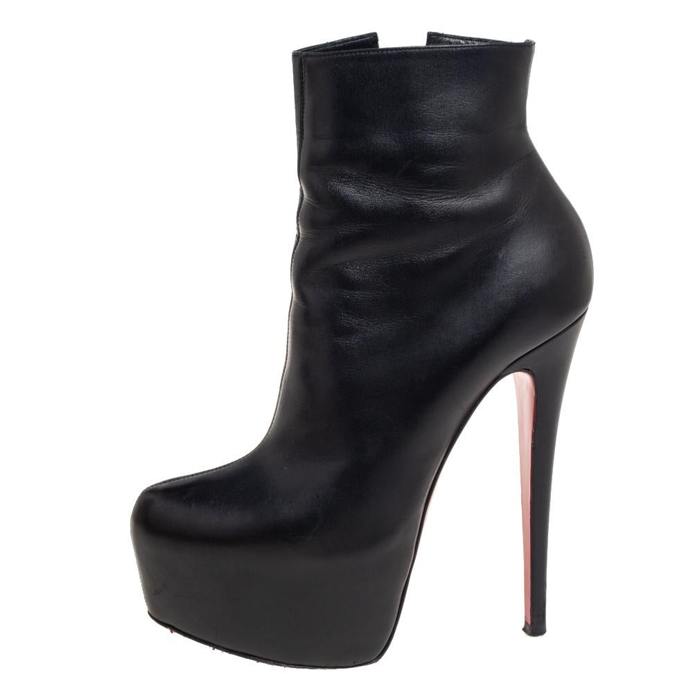 These gorgeous ankle booties from Christian Louboutin epitomize the concept of high fashion. They are crafted from black leather and designed with zippers on the sides. They are equipped with comfortable leather-lined insoles and are elevated on