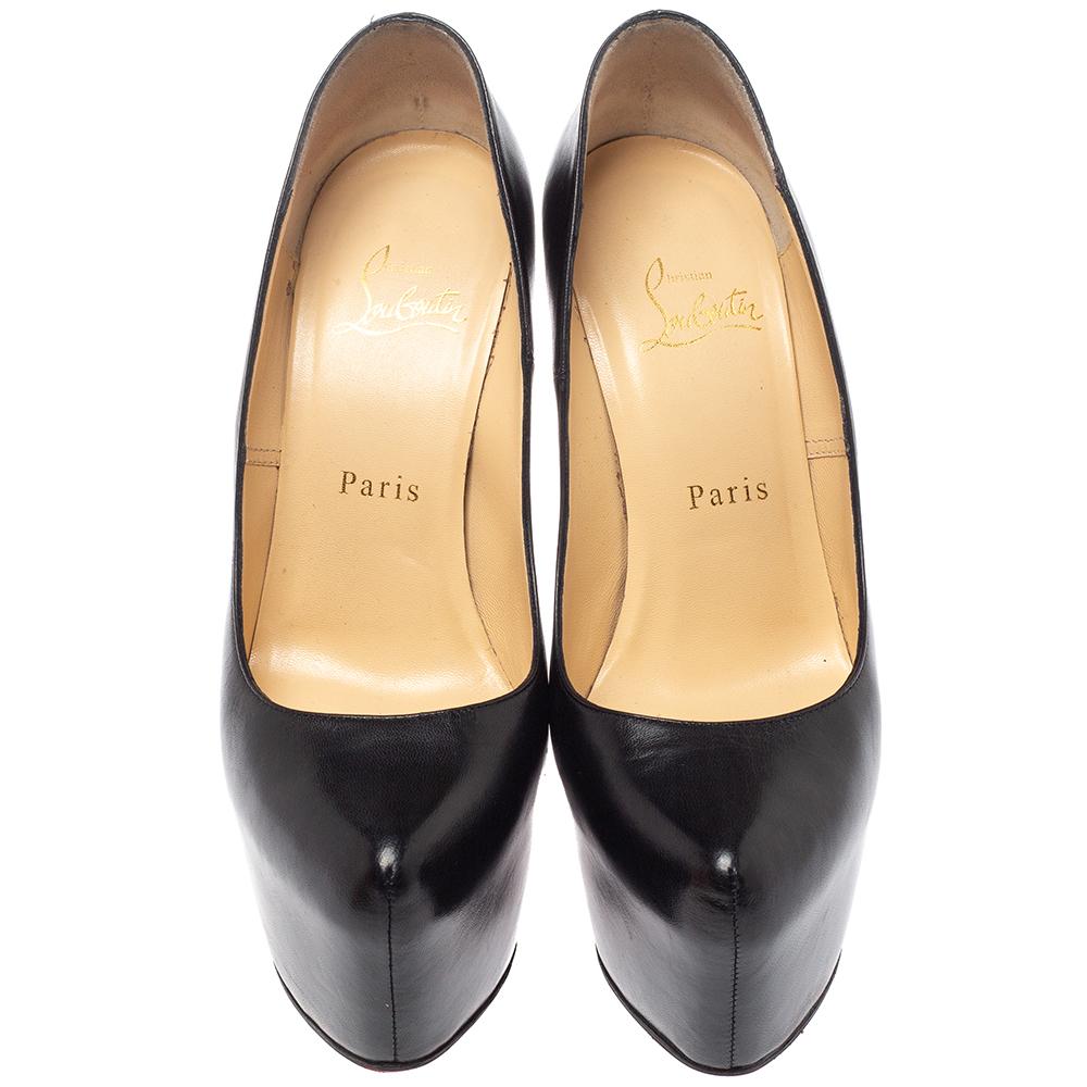 Take your love for Louboutins to new heights by adding this gorgeous Daffodile pair to your collection. The pumps speak of high fashion in every stitch and curve. The exterior is made from black leather and is finished with concealed chunky