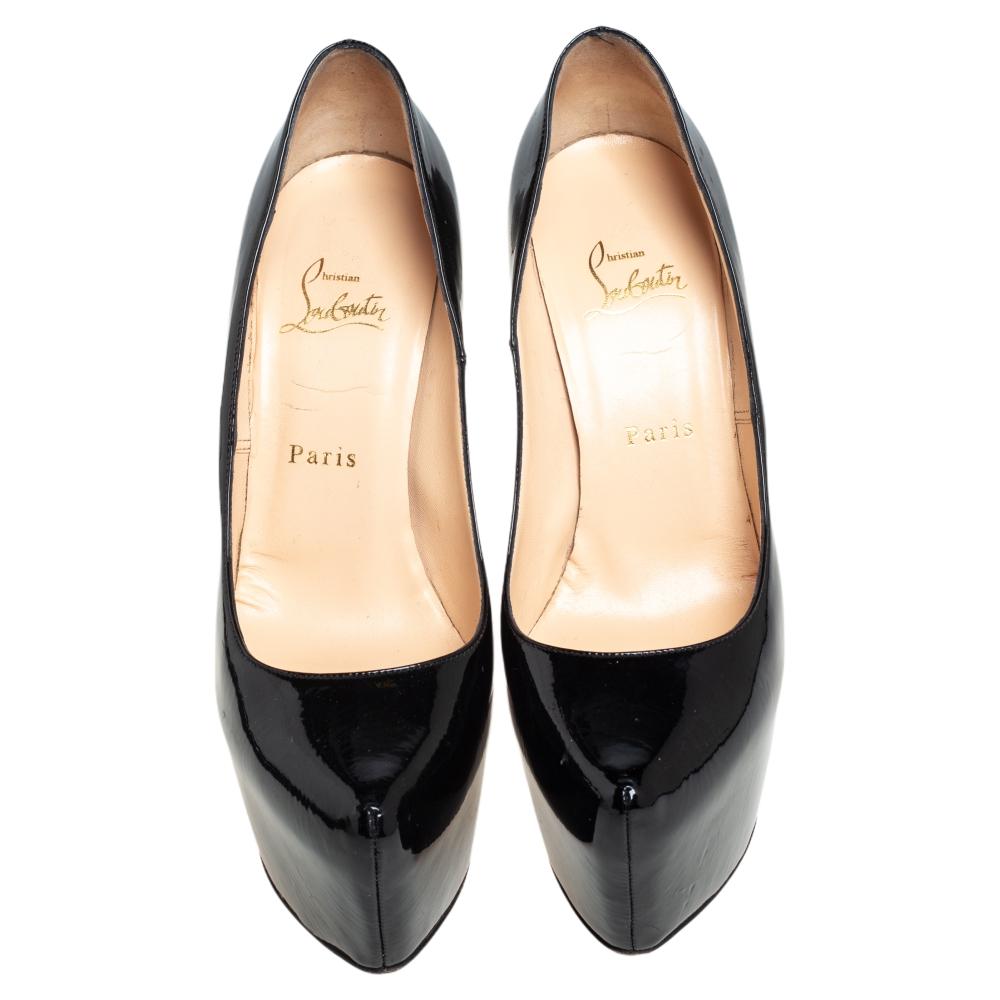 Take your love for Louboutins to new heights by adding this gorgeous pair to your collection. The pumps simply speak high fashion in every stitch and curve. The exteriors come made from patent leather and the pumps are finished with platforms, 16 cm