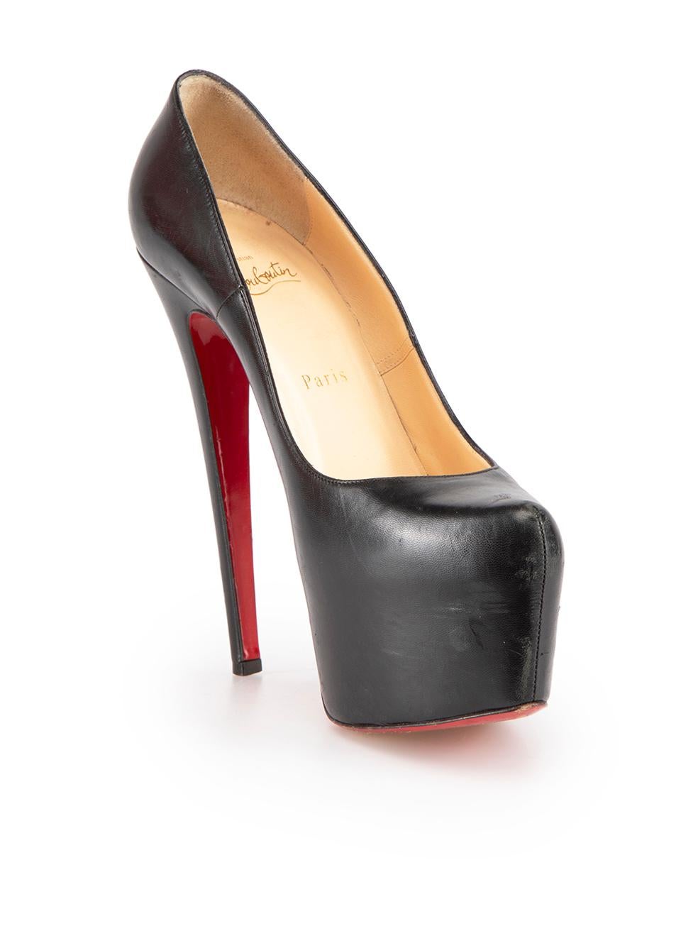CONDITION is Good. General wear to heels is evident. Moderate signs of wear to overall leather where abrasion, scratches and indents is visible on this used Christian Louboutin designer resale item.

Details
Dolly
Black
Leather
Heels
Platform
Point