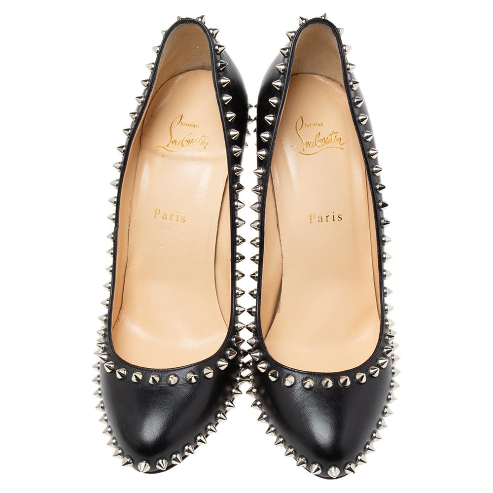 Create an edgy look with these Christian Louboutin pumps that are decorated with silver-tone studs. Crafted from black leather, they are designed with slender 11 cm heels, leather-lined insoles, and comfy soles.

