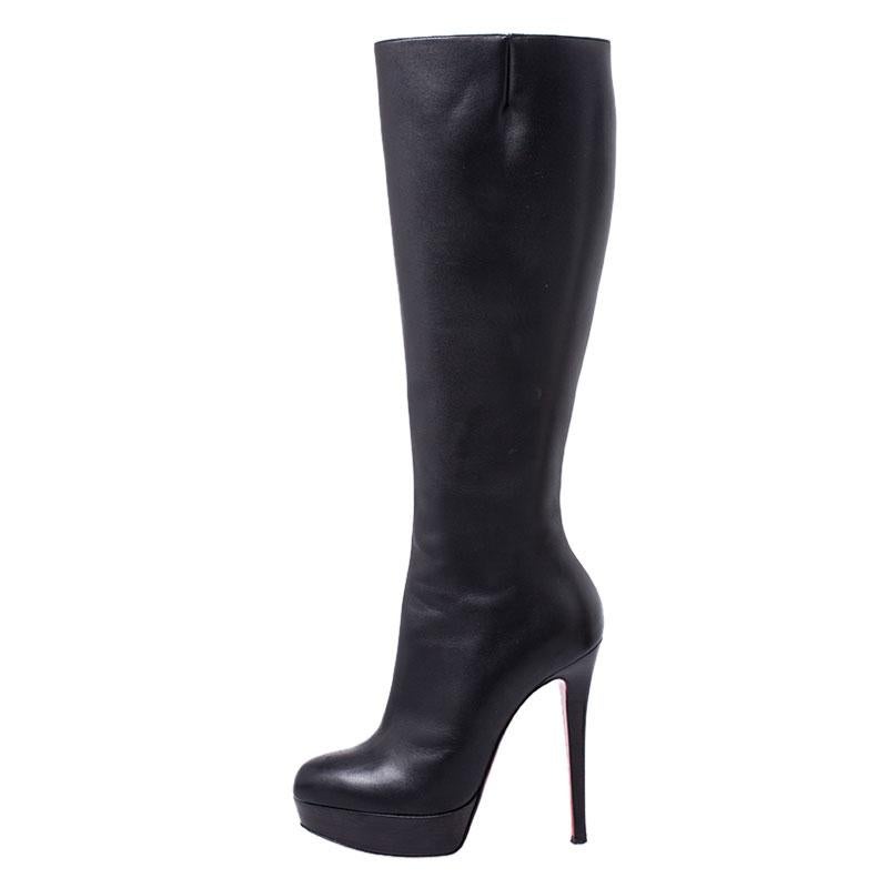 Every shoe collection is incomplete without a pair of high-fashion boots. These Christian Louboutin beauties have been created from leather and styled with platforms and 13 cm high heels. The boots are complete with side zippers and the signature