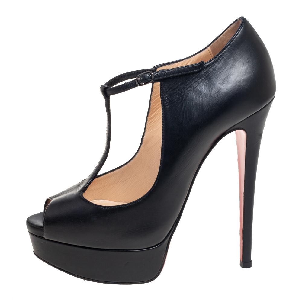 The elegant construction of this pair of Jilopa pumps shows Christian Louboutin's mastery in shoemaking. Crafted from leather into a peep-toe silhouette, it has been styled with a slim T-strap, platforms, and 14cm heels. The signature red-lacquer