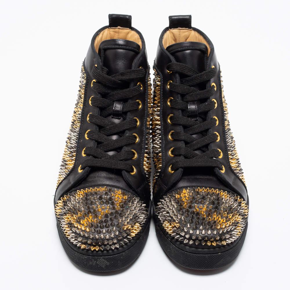 These Louis Spikes sneakers from Christian Louboutin are super sturdy, stunning, and stylish. They are crafted from black leather into a high-top silhouette. Embellished with studded accents, they showcase lace-up fastenings and silver-tone and