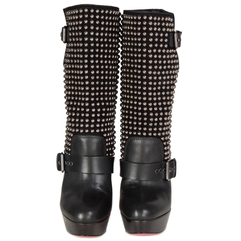 
100% authentic Christian Louboutin 'Marisa' studded platform boots in black leather and suede. Adjustable-buckled top vent; pull on style. Have been worn once and are in virtually new condition.

Measurements
Imprinted Size	37
Shoe Size	37
Inside