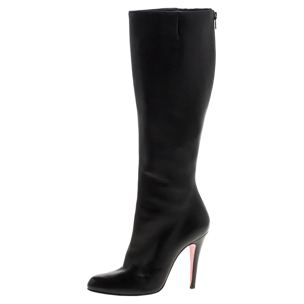 Louboutins are designed to lift one's attitude and outfit. Let this pair lift yours as well by owning them today. Crafted from leather, these black boots carry a sleek knee-high silhouette. Completed with 10 cm heels and the signature red soles,