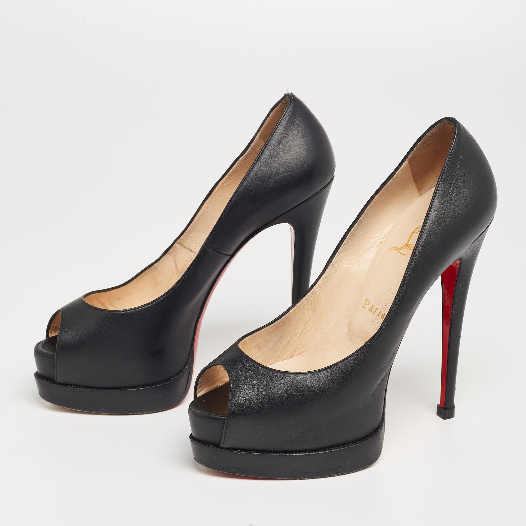 Crafted from black leather, this pair of pumps from the house of Christian Louboutin has been designed to add a classy update to your look. Platforms, peep-toes, and 14 cm heels make this pair a great choice.

