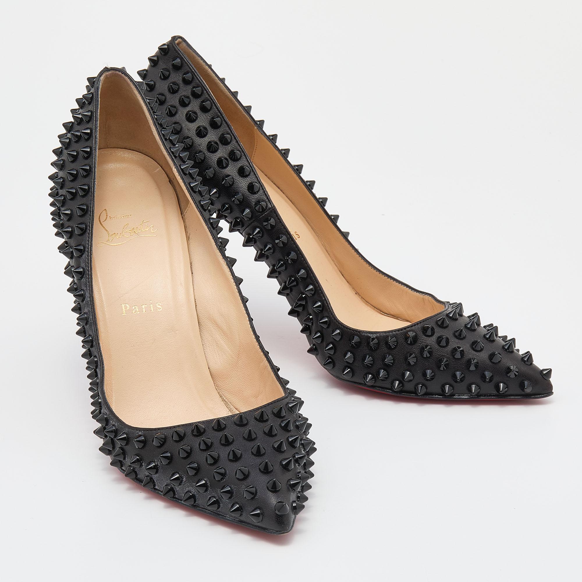 Win praises every time you step out in these pumps from Christian Louboutin! Beautifully designed with leather, they present a gorgeous appeal. The black pair carries pointed toes, 11 cm heels, and spike detailing all over. Complete with leather
