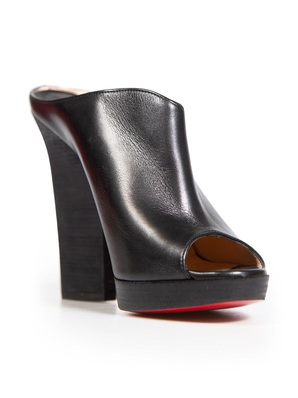 CONDITION is Very good. Minimal wear to shoes is evident. Minimal scratches to both of the wooden heels. A tiny abrasion to the right side of left shoe on this used Christian Louboutin designer resale item. This item comes with dust bag.
 
 Details
