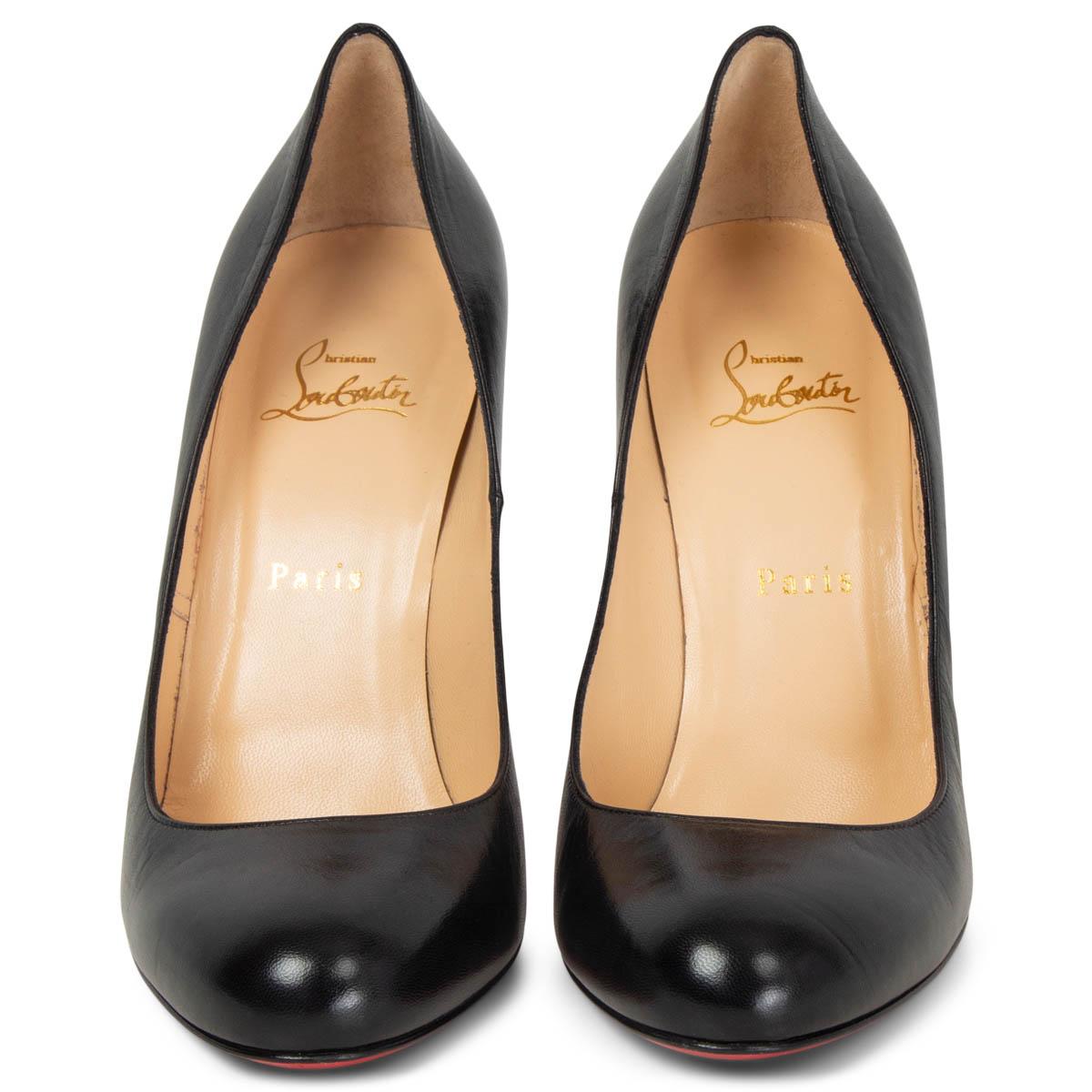 100% authentic Christian Louboutin Simple round-toe pumps in black leather featuring signature red leather sole. Have been worn once or twice and the right shoe shows a small dent on the top part of the heel. Overall in excellent condition.