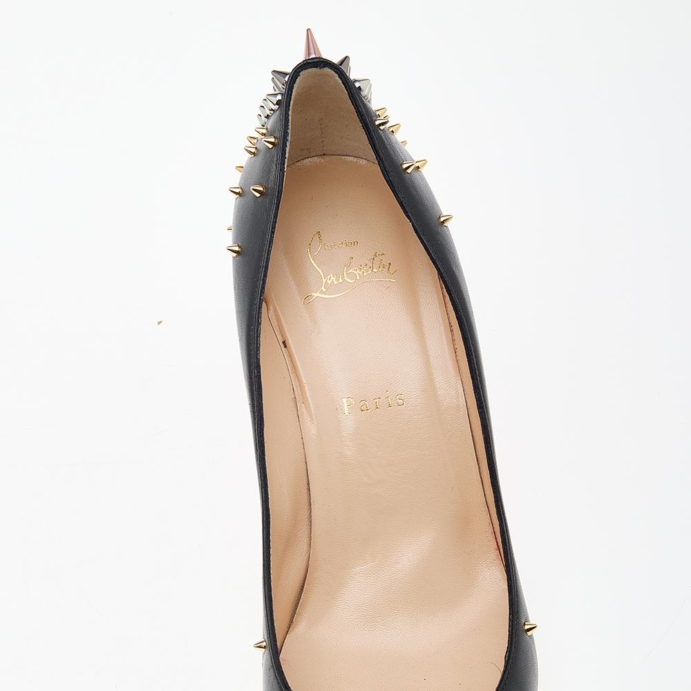Christian Louboutin never fails to impress us with their ultra-glamorous heels, just like these Dinosa pumps that are truly enticing. Crafted from black leather, they are decorated with gold, rose-gold, and silver-tone spikes on the front as well as